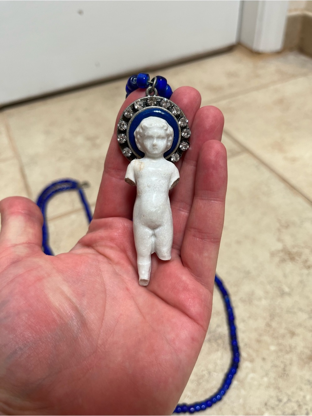 White Porcelain Charlotte Doll Pendant Necklace with Blue African Trading Beads